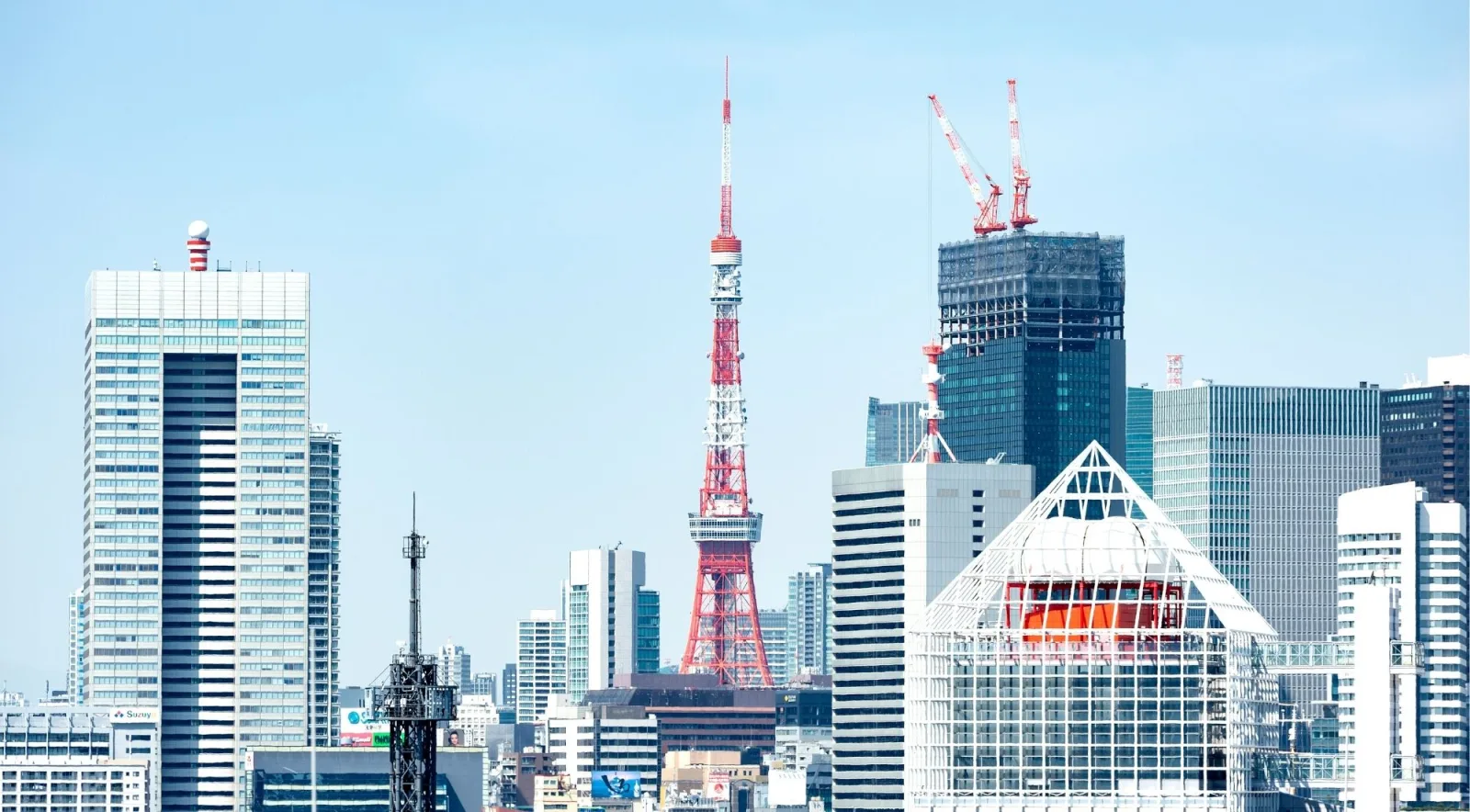 Tokyo Tower and city skyline viewed on a clear morning from near Toyosu
